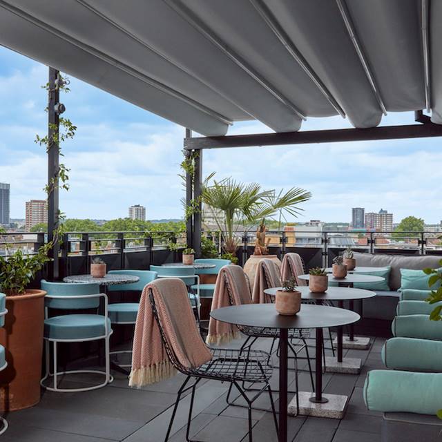 Rooftop terrace at the hotel, featuring open access for the public to enjoy scenic views and a relaxing atmosphere.
